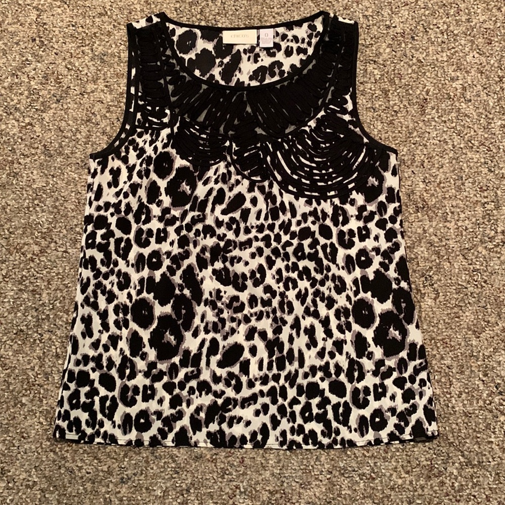 Chico’s sleeveless blouse. Black n white pattern. Size 0.